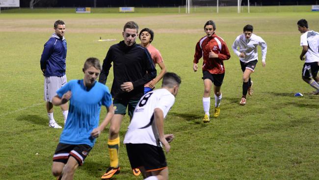 Jason Culina putting the under-15s Barbarians team through their paces at Lynwood Park. Credit: Ian Svegovic.