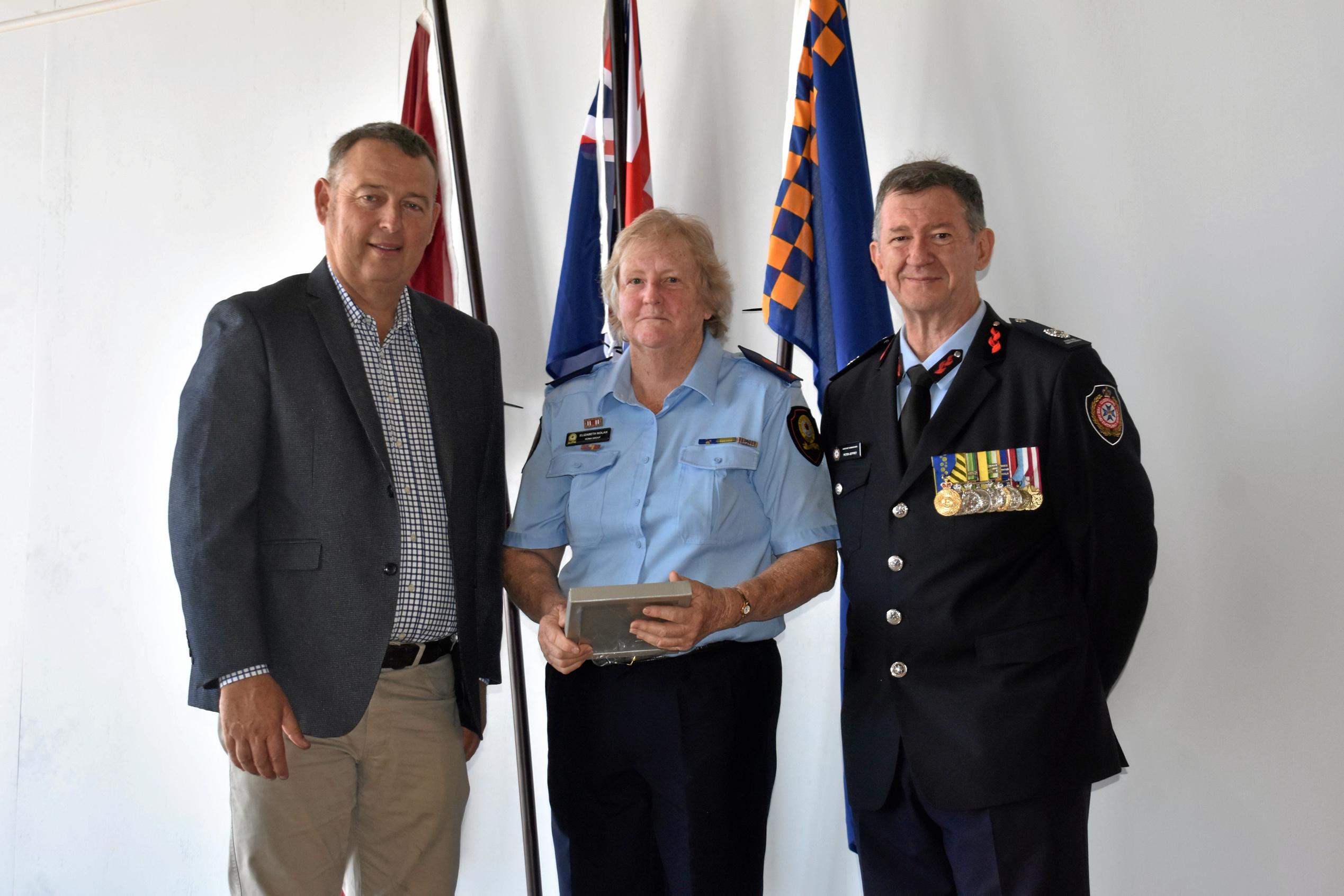 Tyson Golder, Elizabeth Nolan of the Roma SES, and Rob Bundy. Picture: Jorja McDonnell