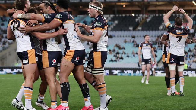 Brumbies players celebrate victory in the round-3 Super Rugby AU match against the Waratahs. Picture: Getty Images