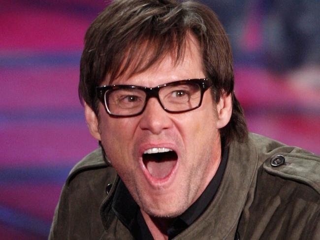 Actor Jim Carrey accepts the Best Comedic Performance award onstage during the 18th Annual MTV Movie Awards held at the Gibson Amphitheatre on May 31, 2009 in Universal City, California. Kevin Winter/Getty Images/AFP == FOR NEWSPAPERS, INTERNET, TELCOS & TELEVISION USE ONLY ==
