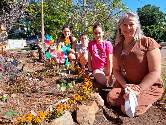 Tilly (left), Ted, Olive and Taryn Claire love the Alexandra St Enchanted Fairy Garden they've helped establish. Picture: Leighton Smith.