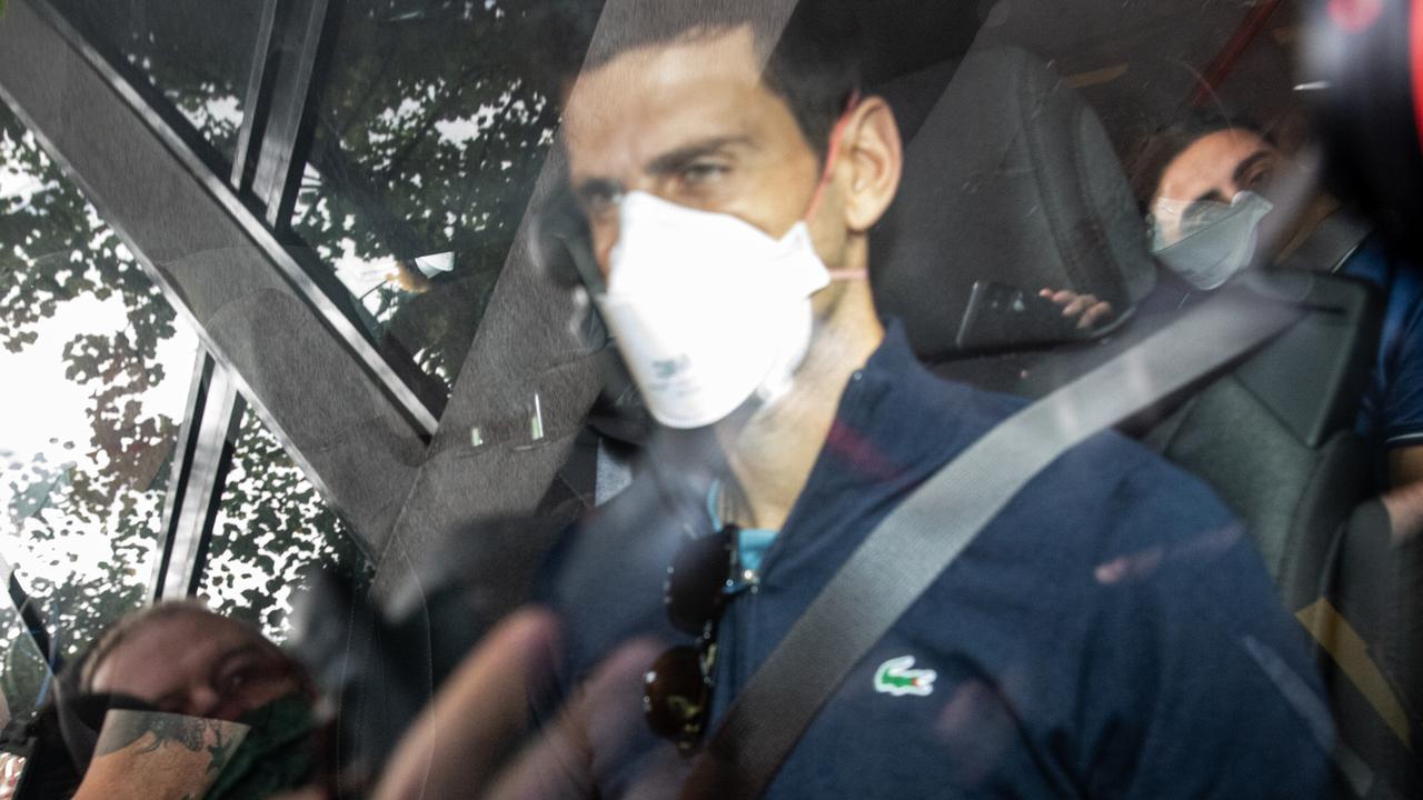 Novak Djokovic leaves Melbourne’s Park Hotel on January 16, 2022 facing deportation after his visa was cancelled by the Australian government. Picture: Getty