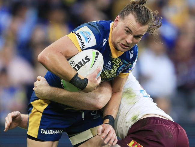 SYDNEY, AUSTRALIA - MAY 23:  Clint Gutherson of the Eels  is tackled during the round 11 NRL match between the Parramatta Eels and the Manly Sea Eagles at Bankwest Stadium, on May 23, 2021, in Sydney, Australia. (Photo by Mark Evans/Getty Images)