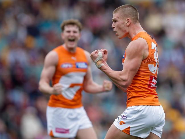 Max Gruzewski enjoys a goal during the Giants’ comeback. Picture: Russell Freeman/AFL Photos via Getty Images