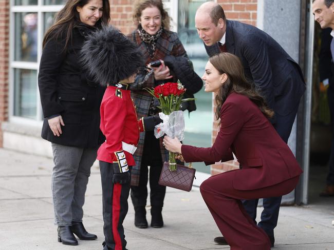 The Wales’ appeared delighted to meet young Henry Dynov-Teixeira, who was decked out in a royal guards uniform. Picture: AFP