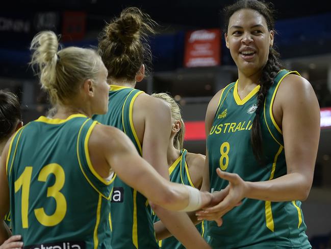 Australia's Elizabeth Cambage, right, smiles as she slaps hands with Erin Phillips, left, during the second half of an exhibition basketball game against France, Friday, July 29, 2016, in Bridgeport, Conn. (AP Photo/Jessica Hill)