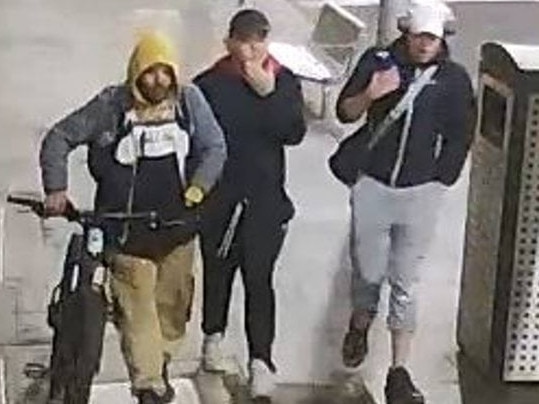 Police are searching for a group of men after a 37-year-old man was allegedly knocked unconscious and robbed while walking in Melbourne's CBD. Picture: Victoria Police.