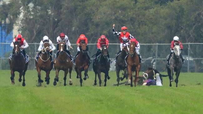 Louise Day was lucky to stay in the saddle on Sunborn as she tried to avoid the fallen horse and rider. Picture: Getty Images