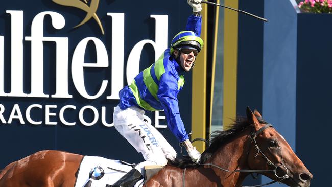 Does lightning strike twice? Nick Hall raises his whip in triumph as Jameka takes out the Caulfield Cup. Picture: Getty Images