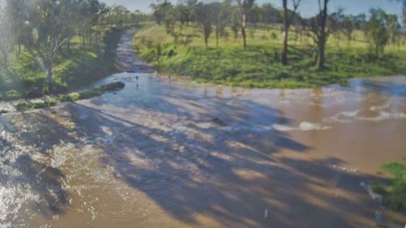 Water over Chinchilla Wondai Rd at Boyne River, Dugong just before 7am Tuesday. Picture: qldtraffic.qld.gov.au