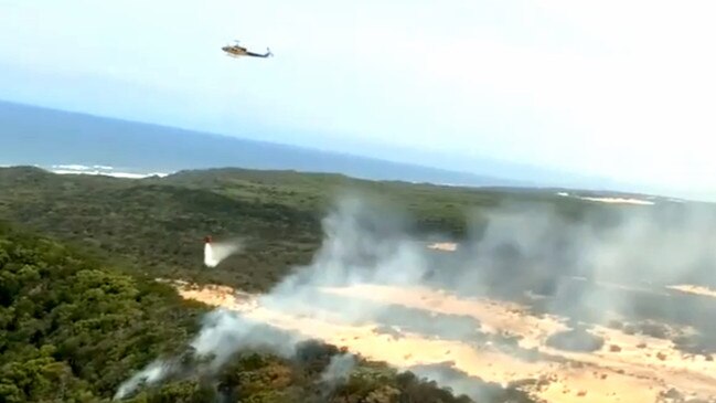 Smoke rising from widespread blazes on Fraser Island. Picture QFES