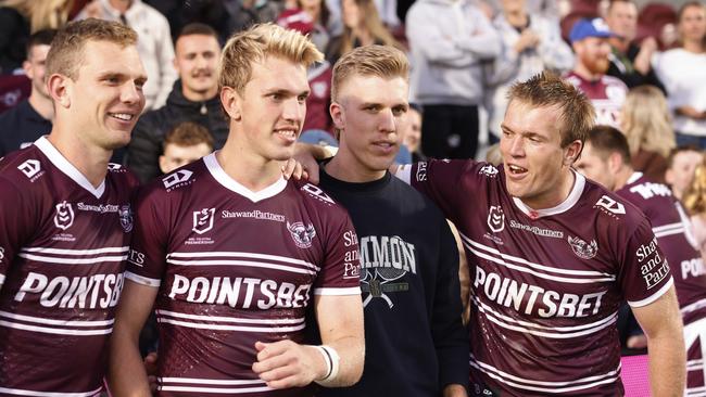 The Trbojevic brothers Tom, Ben, Luke and Jake celebrate a win at 4 Pines Park. Picture; Mark Evans/Getty Images