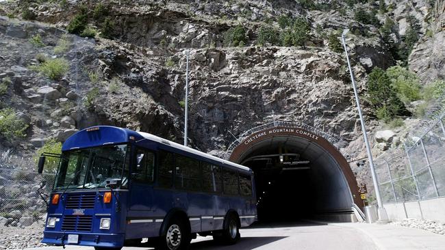 The NORAD personnel work at 7,000 feet inside a granite mountain. Two 25-ton security doors seal the inside offices from any type of attack. NORAD has a self sufficient survival system with independent water and air supplies. (Photo by Robert Nickelsberg/Getty Images)