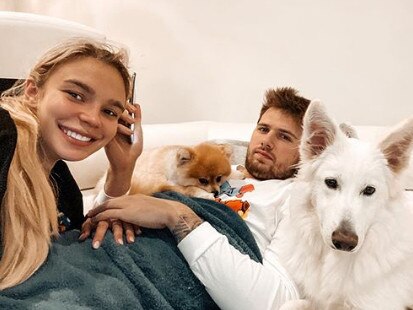 Goltes' posts often feature Doncic and their dogs.