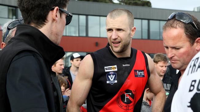 Frankston Bombers coach Beau Muston, pictured speaking with his staff during the Nepean FL grand final last season, made a dramatic citizen’s arrest in Frankston’s CBD last month.  Picture: Mark Dadswell.