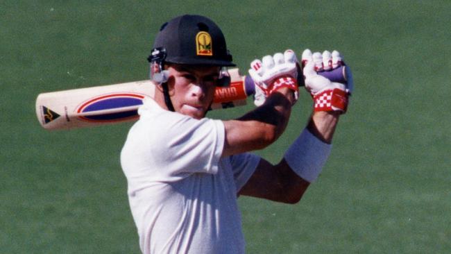 Jamie Cox on the attack for Tasmania.