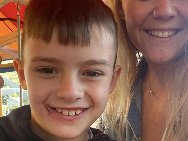 Chelsea Daubney and her son Christian, 9, who lost their home in a fire at Penrith on Saturday. Christian was home alone when a candle fell and started the blaze.https://www.facebook.com/photo/?fbid=2954789941481325&set=pcb.2954790828147903