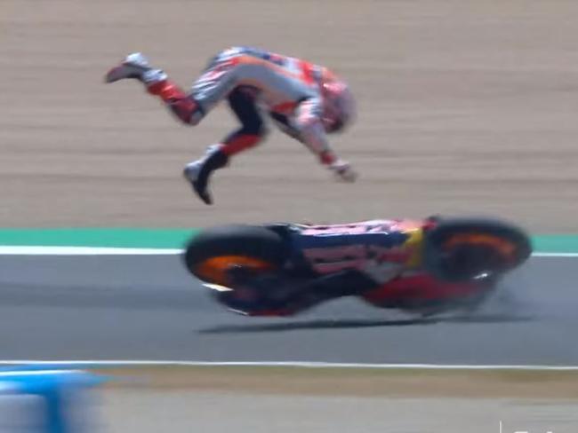 Marc Marquez broke his arm after being sent flying.