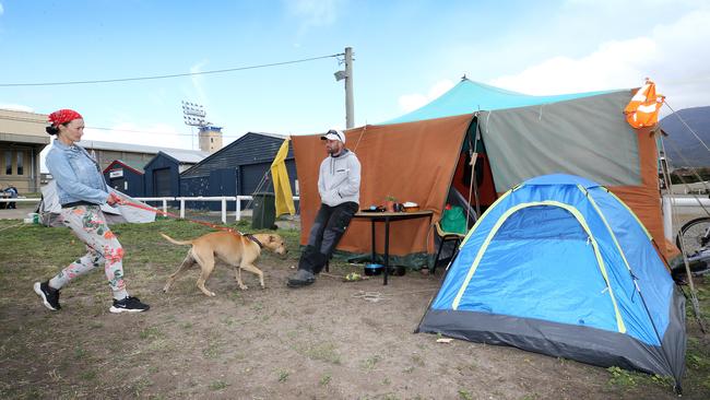 Rowena Worbey and her partner outside their tent at the Royal Hobart Showgrounds. Picture: CHRIS KIDD