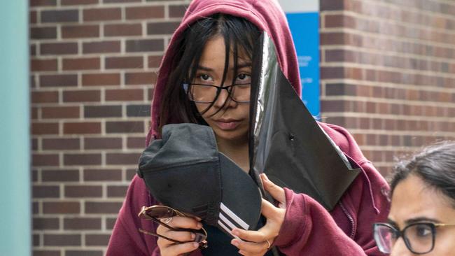 Ngan Vy Bui, 18, from Ryde leaving Burwood Court. (AAP/Image Matthew Vasilescu)