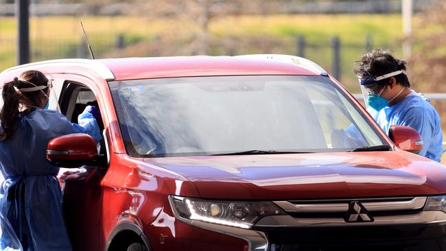 Residents are tested at a drive through Covid-19 testing clinic at Blacktown International Sportspark. Picture: NCA NewsWire / Damian Shaw