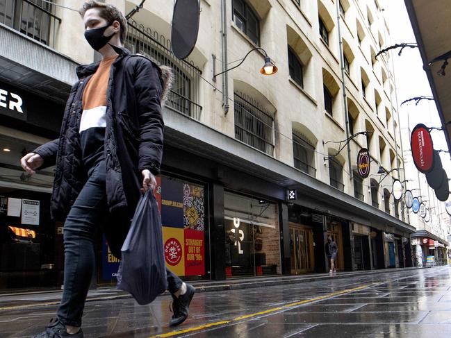 MELBOURNE AUSTRALIA - NewsWire Photos AUGUST 23, 2020: A man walks down a deserted Degraves st in Melbourne CBD on Sunday during stage 4 Covid lockdown. Picture: NCA NewsWire / David Geraghty