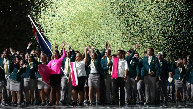 Mark Knowles, flag bearer of Australia arrives with the Australia team during the Opening Ceremony for the Gold Coast 2018 Commonwealth Games at Carrara Stadium. (Photo by Ryan Pierse/Getty Images)