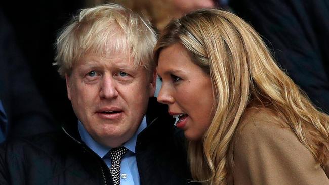 Britain's Prime Minister Boris Johnson with his partner Carrie Symonds. Picture: AFP