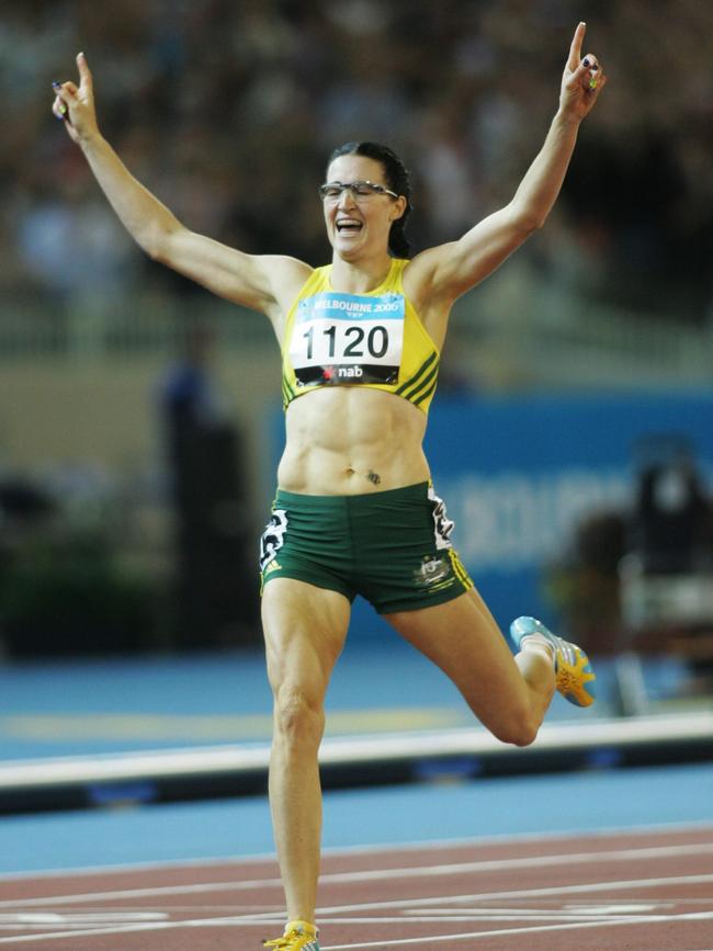 Pittman crosses the line first in the women’s 400m hurdles final at the 2006 Commonwealth Games in Melbourne. Picture: Phil Hillyard