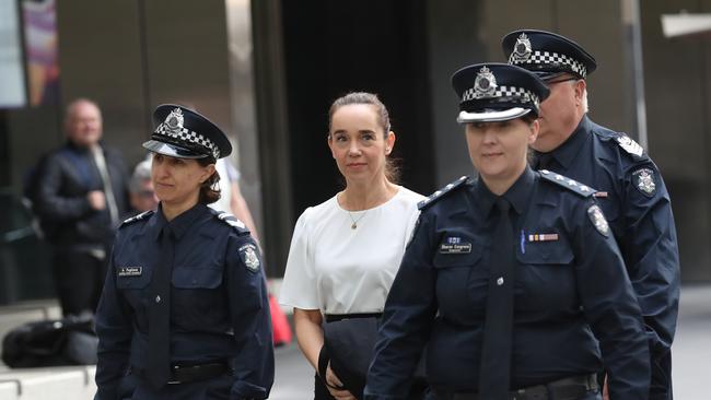 Police officers arrive at the County Court on Wednesday. Picture: NCA NewsWire / David Crosling