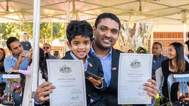 New Australian citizen Piyadigamage Lashen De Silva with his four-year-old son, Reyon De Silva Pyadigamage.