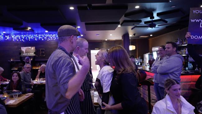 Tash Peterson and celebrity chef John Mountain lock horns in Fyre restaurant. Picture: Facebook