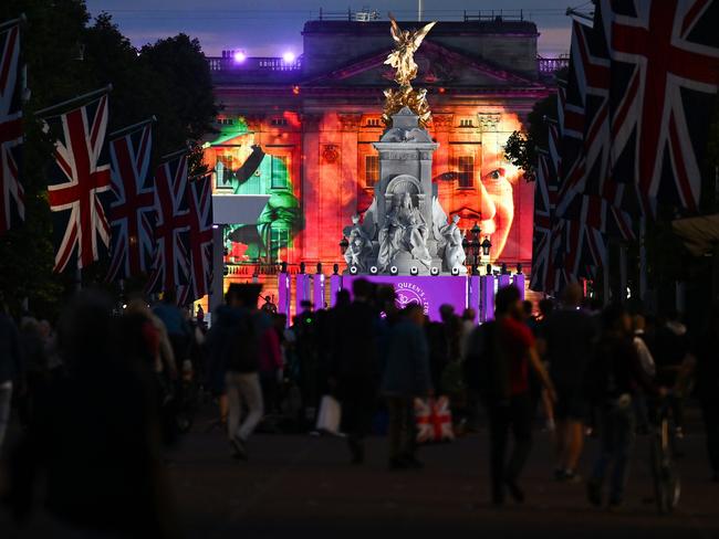 Images of The Queen were beamed onto Buckingham Palace. Picture: Getty