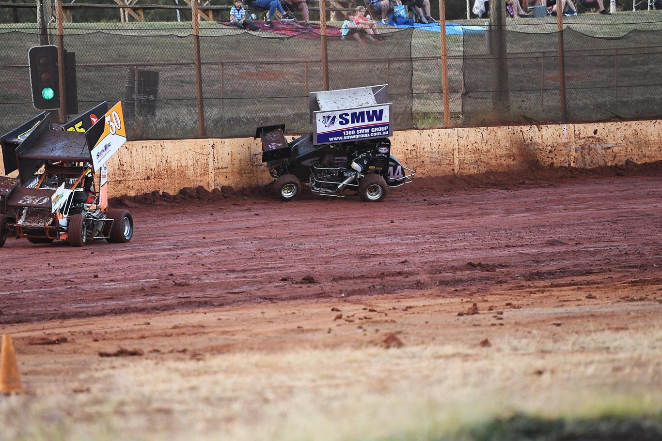 Maryborough Speedway Round One - Ken Newton climbs the wall after losing control on the slippery track. Picture: Cody Fox