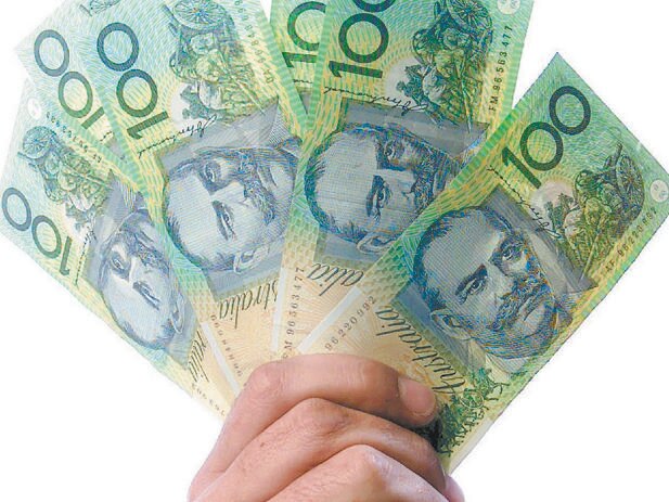 18/05/2001 NEWS: 18/05/2001 NEWS: 18/05/2001. Generic photo of hand holding Australian one hundred dollar notes. Money, note, currency, $100. Pic. Andy Baker Pic. Baker Andy
