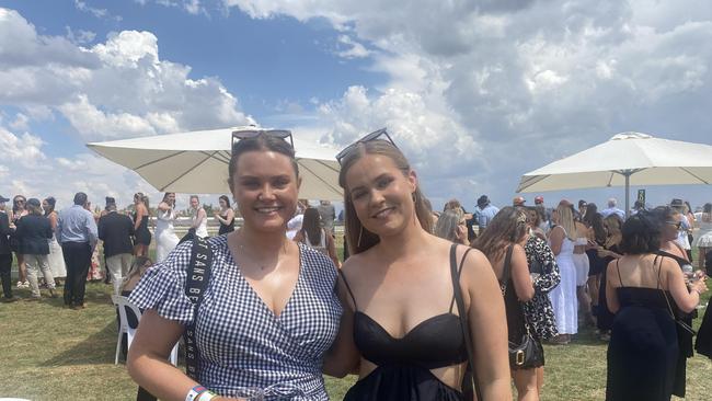 Punters dressed in their finest black and white for Derby Day celebrations in Dubbo. Photo: Tijana Birdjan