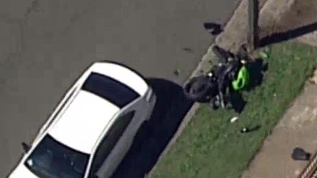 One person is dead following a crash, involving a motorbike on Rickard St, Auburn. Picture: Seven News