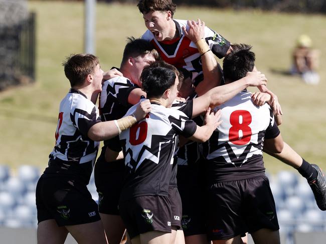 DAILY TELEGRAPH AUGUST 17, 2022. Erindale College celebrating winning their quarter-final game against Patrician Brothers Blacktown in the NRL Schoolboys Cup at Campbelltown Sports Stadium. Picture: Jonathan Ng