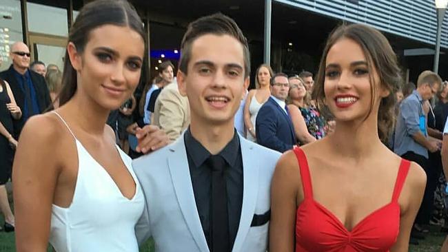 Climate activist Eric Herbert with his Instagram-famous model sisters Elisha and Renee Herbert.