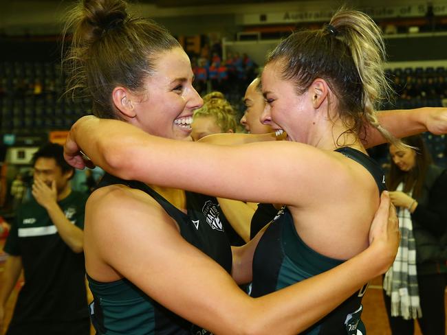 CANBERRA, AUSTRALIA - JULY 01:  Tasmanian Magpie players celebrate during the Australian Netball League grand final between the Tasmanian Magpies and the Canberra Giants at AIS Arena on July 1, 2018 in Canberra, Australia.  (Photo by Mark Nolan/Getty Images)