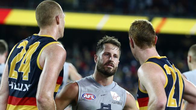 Incoming Crows SANFL captain Matthew Wright talks with former Blue Sam Jacobs and Tom Lynch. Picture Sarah Reed