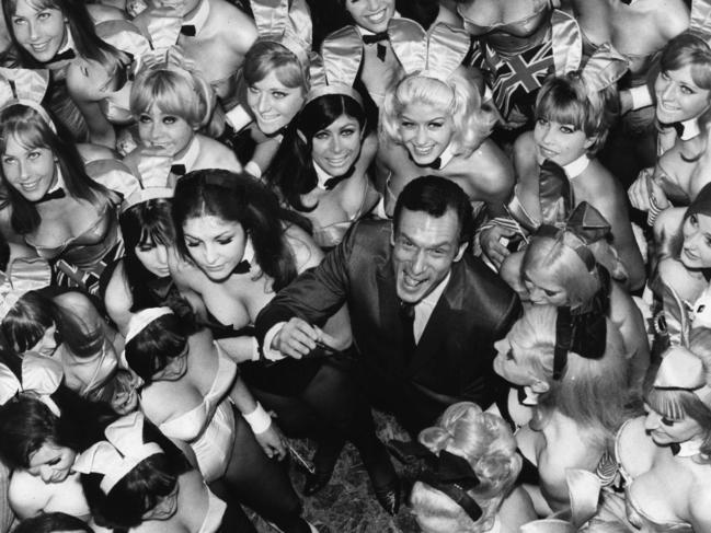 Playboy founder Hugh Hefner surrounded by Playboy Bunny Girls in photo from TV documentary program 'Sex in 69: Sexual Revolution in America', on History Channel.