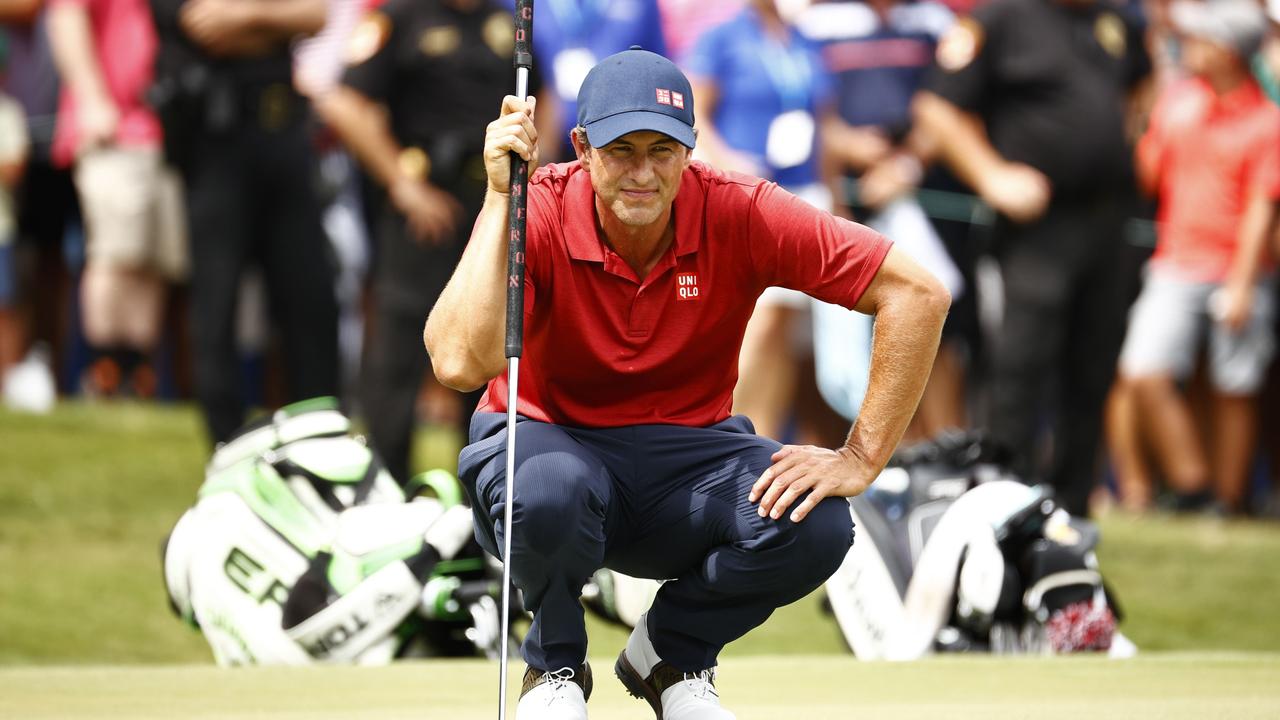 Adam Scott lines up the putt he missed. Picture: Jared C. Tilton/Getty Images/AFP