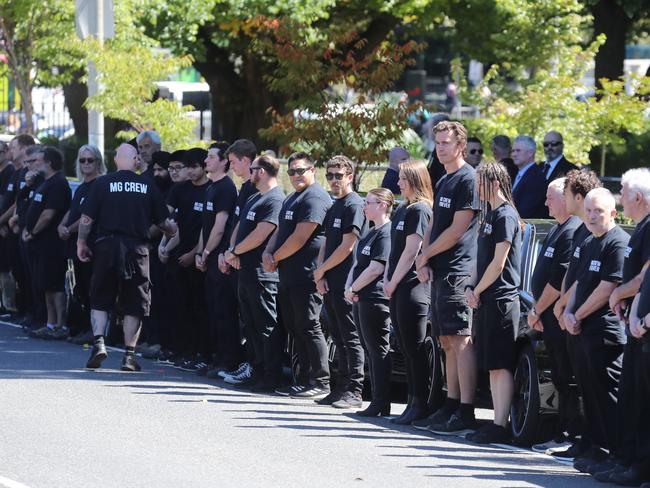 Roadies form a guard of honour. Picture: Alex Coppel.