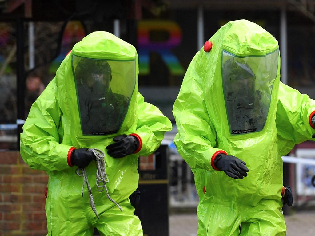 Emergency services affix the tent over the bench where former Russian spy Sergei Skripal and his daughter Yulia were found in March in critical condition. Picture: AFP/Ben Stansall