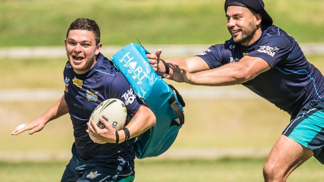 Ash Taylor on the run during a Titans training session.