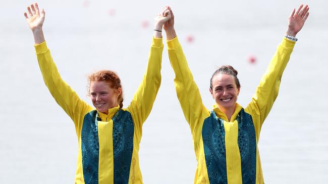 PARIS, FRANCE - AUGUST 02: Bronze medalists Jess Morrison and Annabelle McIntyre of Team Australia celebrate on the podium at the Rowing Women's Pair medal ceremony on day seven of the Olympic Games Paris 2024 at Vaires-Sur-Marne Nautical Stadium on August 02, 2024 in Paris, France. (Photo by Alex Davidson/Getty Images)