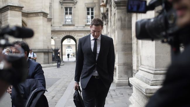 Former All Blacks rugby player Ali Williams arrives at the Paris courthouse.