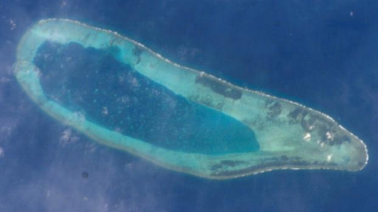 A photograph taken from the International Space Station appears to show China building on the reef in the Paracel Islands. Picture: NASA