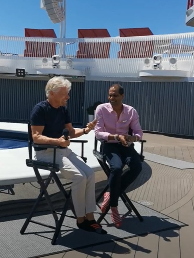 SSir Richard with Virgin Voyages CEO, Nirmal Saverimuttu at a press conference on-board the ship on Tuesday. Picture: news.com.au